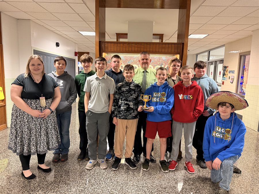 Group photo of students with a teacher.