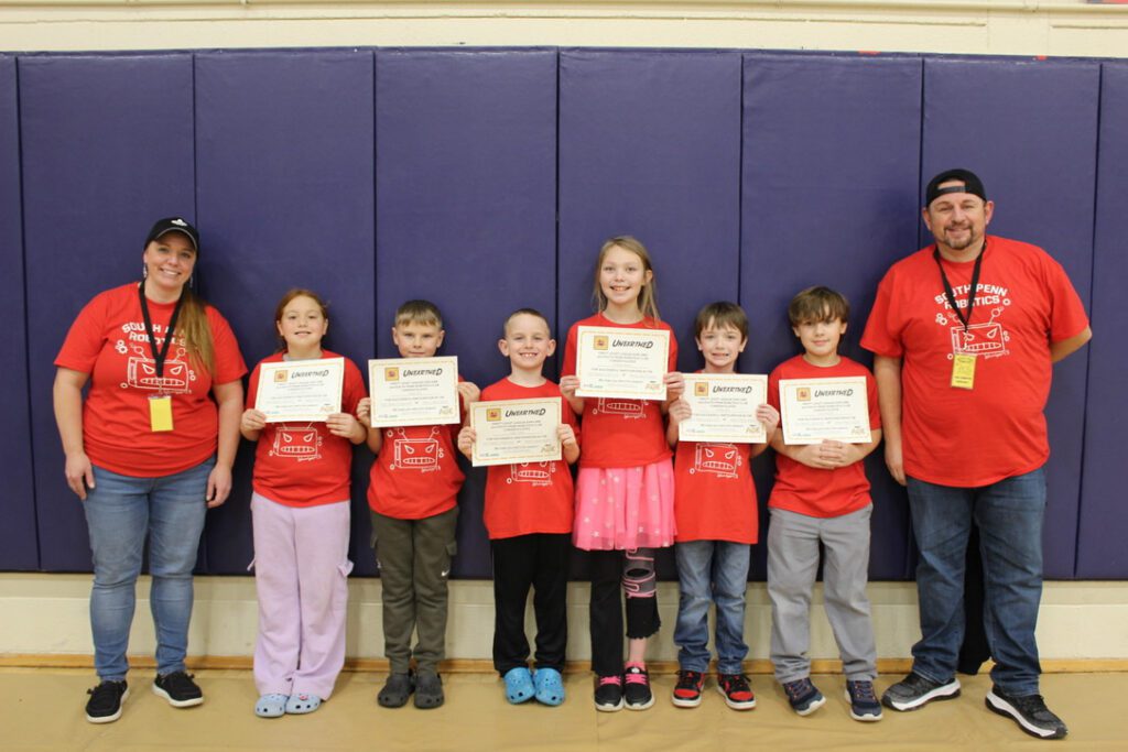 Group photo of South Penn Robotics with their certificates.