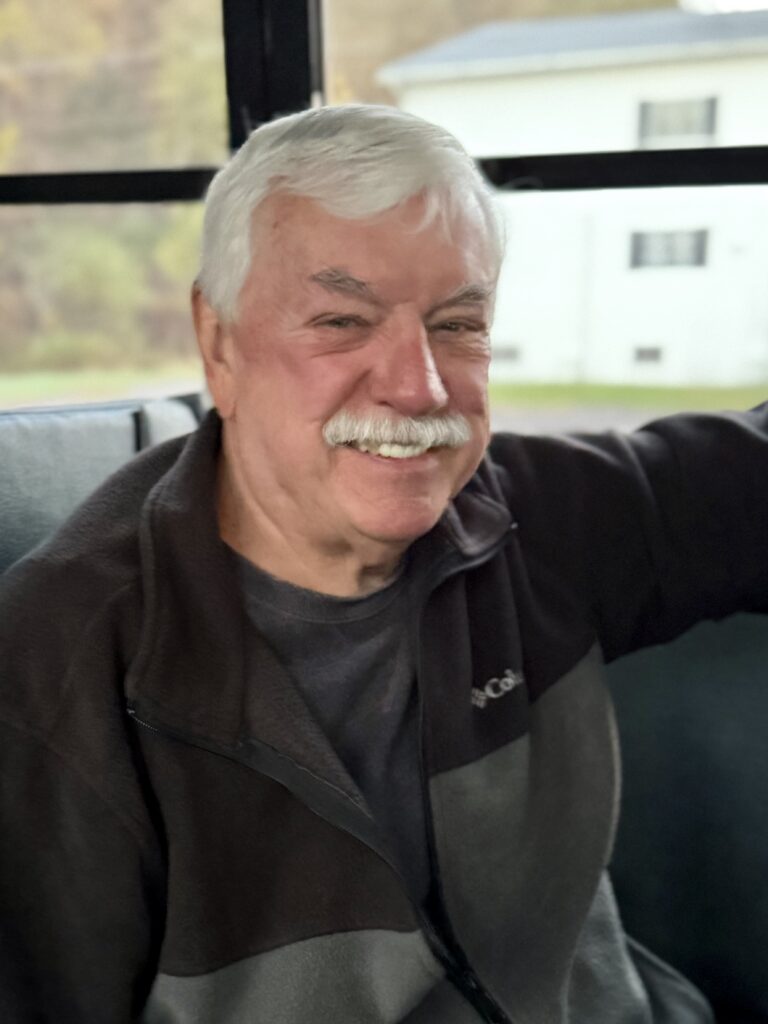 Mr. George, a Bus Instructional Aide, on a break between runs.